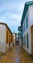 Street with colorful buildings after rain perspective