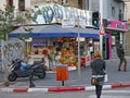 street with a colorful juice bar