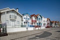 Street with colorful striped houses typical of Costa Nova, Aveiro, Portugal