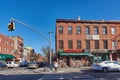 Street corner with old brick buildings on Court St. in Carroll Gardens, Brooklyn, NYC showing the storefront of Sal`s Pizzeria