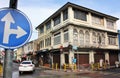 Street corner with Sino Portuguese architecture and traffic sign in Phuket Town, Thailand