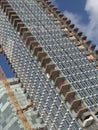 Street corner view of a construction site of a skyscraper building