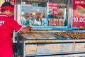Street counter selling mackerel sandwiches in Istanbul. Street food in Turkey