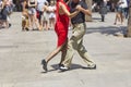 Street couple dancers performing tango dance