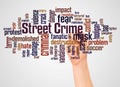 Street Crime word cloud and hand with marker concept