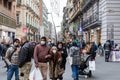 Street crowded with people with protective masks, in Naples, Italy