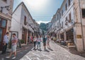 Street crowded with tourists in Gjirokaster, Albania