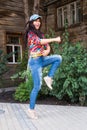 Street dance, freestyle and jazz funk concept - Beautiful girl dancing hip-hop outdoor Royalty Free Stock Photo