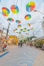 Street decorated with colored frevo umbrellas in Porto de Galinhas downtown Royalty Free Stock Photo