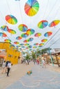 Street decorated with colored frevo umbrellas in Porto de Galinhas downtown Royalty Free Stock Photo