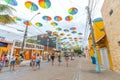 Street decorated with colored frevo umbrellas in Porto de Galinhas downtown Royalty Free Stock Photo