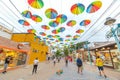 Street decorated with colored frevo umbrellas in Porto de Galinhas downtown Royalty Free Stock Photo