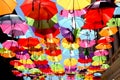 Street decorated with colored and open umbrellas Royalty Free Stock Photo