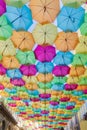 Street decorated with colored umbrellas. Colorful decoration for tourism in Agueda and Aveiro Portugal. travel postcard and