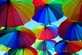 Street decorated with colorful umbrellas to attract customers and tourists