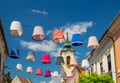 Street decoration of plenty colorful lampshades in old town of Szentendre, Hungary at sunny summer day
