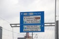 Street direction sign at the Erasmusbrug with all directions to parking lots