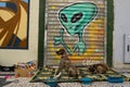 Street dogs and alien street artwork in the background