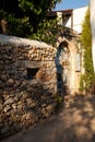 Street and door of Can Yucel\'s house in Old Datca, a Turkish writer, poet and translator, Datca Mugla Turkey, June 29 2023