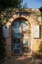 Street and door of Can Yucel\'s house in Old Datca, a Turkish writer, poet and translator, Datca Mugla Turkey, June 29 2023