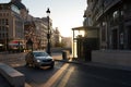 Street in downtown Madrid with rays of sun early in the morning. Spain.