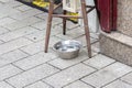 Street drinker for homeless animals, dog and cat feeder for hot weather in the city, animal care and grooming.