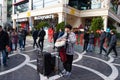 Street Drummer in central square of Baku - Azerbaijan: 31 December 2021. A street musician plays tom-tom on a drum.