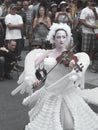 Street entertainer playing violin.