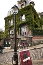 A street and a famous building in Montmartre, Paris