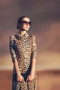 Street fashion portrait stylish pretty woman in a dress Royalty Free Stock Photo