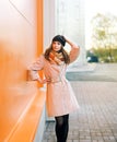 Street fashion, pretty woman model in coat and hat Royalty Free Stock Photo