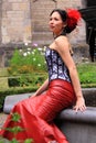 Street style fashion red leather skirt