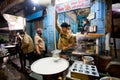 Street fast-food shop with guy who prepares the milk