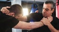 Street fighting self defense technique against holds and grabs Royalty Free Stock Photo