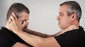 Street fighting self defense technique against holds and grabs Royalty Free Stock Photo