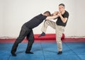 Street fighting self defense technique against holds and grabs Royalty Free Stock Photo