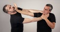 Street fighting self defense technique against holds and grabs Royalty Free Stock Photo