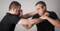 Street fighting self defense technique against holds and grabs Royalty Free Stock Photo