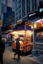 Street food cart in Times Square, New York, USA at night Royalty Free Stock Photo