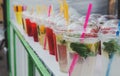 Street food and drinks. Fresh fruit cocktail in a plastic glass Royalty Free Stock Photo