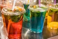 Street food and drinks. Fresh fruit cocktail in a plastic glass Royalty Free Stock Photo