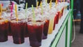 Street food and drinks. Fresh fruit cocktail in a plastic glass Royalty Free Stock Photo