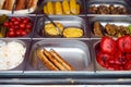Street food grilled tomato, sausages, pineapple, sauerkraut, pepper, vegetable, corn, showcase market