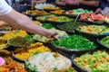 Street food in Luang Prabang, Laos. Delicious food stall selling colorful vegetable dishes to tourist. Asian cuisine, tasty food,