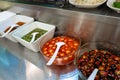 Street food market in Asia. Bowls with hot sauces of various types Royalty Free Stock Photo