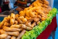 Street food market in Asia. Food counters, mini barbecue on a stick also called satey Royalty Free Stock Photo