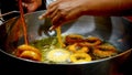 Street food preparation - traditional Peruvian sweets picarones