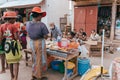 Street food seller on the main street in Miandrivazo. In Madagascar, people usually eat on the street