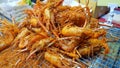 Street foods thailand - fried shrimps , fried prawn balls and other seafood for sale in the market Royalty Free Stock Photo