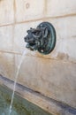 Street fountain in Geneva, Switzerland. Fountains with drinkable water are very common in Swiss cities. Potable water in the city